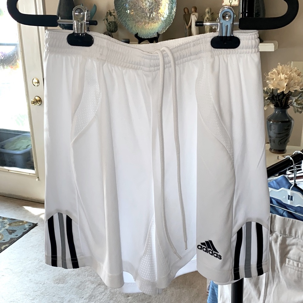 Adidas Womens Three-stripe sports short.   NWOT